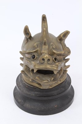 Lot 1058 - Antique Chinese bronze censer cover in the form of a dragons 
head