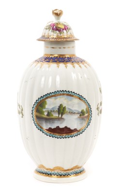 Lot 1 - A Worcester fluted porcelain tea caddy and cover, circa 1780, of Dalhousie type, painted with a landscape panel, sprays of fruit and insects, with gilt and enamelled patterned borders, crescent mar...
