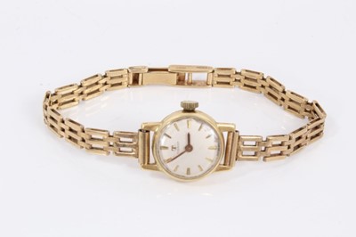 Lot 151 - Vintage ladies Tissot wristwatch in 14ct gold case on 9ct gold bracelet