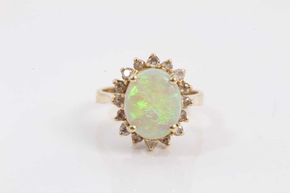 Lot 154 - Opal and diamond cluster ring