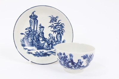 Lot 7 - A Worcester blue and white tea bowl and saucer, circa 1775-85, printed with the Mother and Child pattern, the saucer blue-lined and measuring 12.5cm diameter