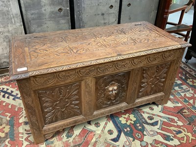 Lot 1424 - Art and Crafts carved oak coffer