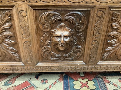 Lot 1424 - Art and Crafts carved oak coffer