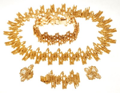 Lot 402 - 1970s Grima-style gilt metal suite of jewellery comprising necklace, bracelet and earrings