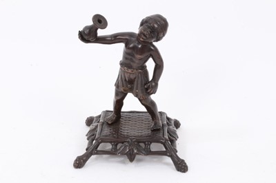 Lot 792 - Bronze figure of an african boy in a fez