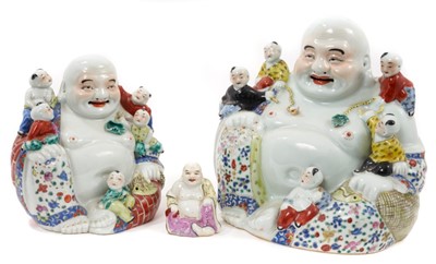 Lot 116 - Three Chinese porcelain Buddhas