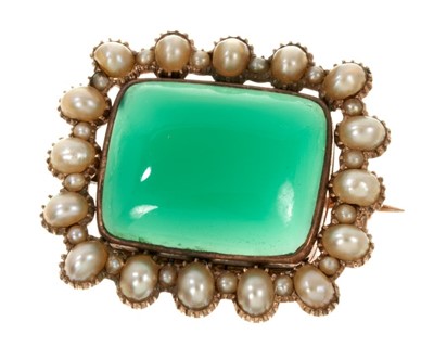 Lot 502 - Georgian chrysoprase and seed pearl brooch/locket with a rectangular cabochon chrysoprase surrounded by a border of split pearls in gold setting with glazed locket compartment to the reverse, 28mm...