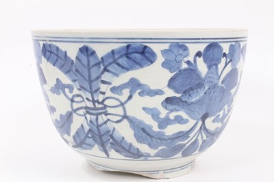 Lot 18 - A Japanese blue and white porcelain bowl, Edo period, painted with a foliate pattern, 16cm high