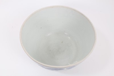 Lot 18 - A Japanese blue and white porcelain bowl, Edo period, painted with a foliate pattern, 16cm high