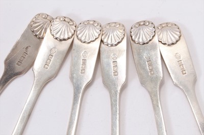Lot 235 - Set of six George V silver fiddle and shell pattern dessert spoons (Sheffield 1915)