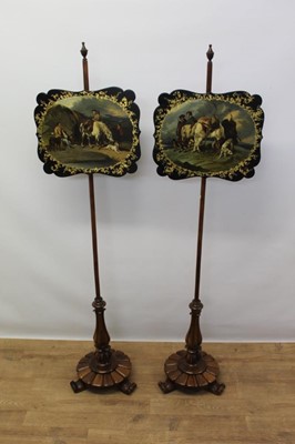 Lot 1284 - Pair of mid-19th century rosewood polescreens with papier mâché painted plaques after Landseer