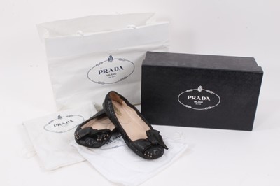 Lot 2077 - Pair of  Prada shoes, black leather pumps with metal studs.