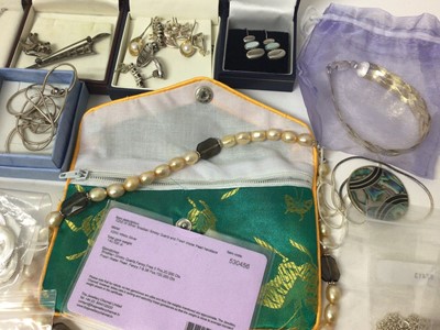 Lot 67 - Group of silver chains, some new in packets, silver pendants, earrings and brooches