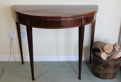 Lot 1237 - George III inlaid mahogany demi-lune tea table with fold-over top, on square taper legs, 90cm x 44cm