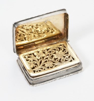 Lot 240 - Early Victorian silver castle top vinaigrette of rectangular form, with raised foliate borders, relieff Windsor Castle.