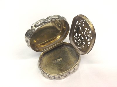 Lot 245 - Early Victorian silver castle top vinaigrette of shaped oval form, sunset river scene.