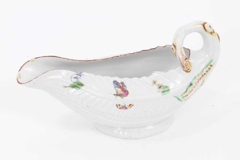 Lot 69 - A Worcester cos lettuce shaped sauce boat, painted in Meissen style, circa 1756