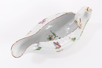 Lot 30 - A Worcester cos lettuce shaped sauce boat, painted in Meissen style, circa 1756