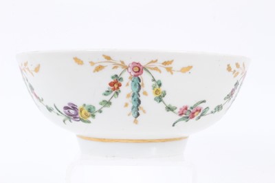 Lot 353 - A Bristol round bowl, painted with garlands of flowers and leaves, circa 1775