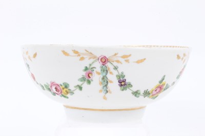 Lot 73 - A Bristol round bowl, painted with garlands of flowers and leaves, circa 1775