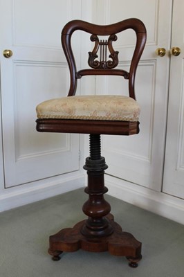 Lot 1253 - Victorian mahogany harpists' chair with shaped back and lyre support, revolving adjustable seat, on turned column and trefoil base, 98cm when fully adjusted