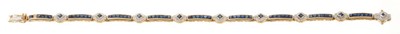 Lot 447 - Sapphire and diamond bracelet in 9ct yellow gold setting