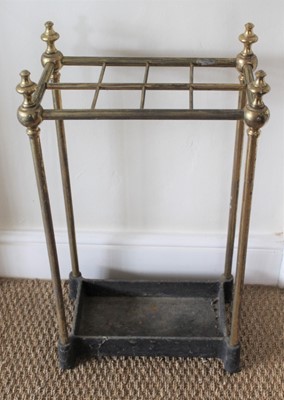 Lot 1257 - Victorian-style brass and cast iron stick stand with eight divisions, 65cm high x 21cm wide