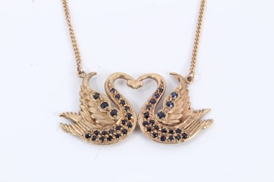 Lot 485 - 9ct gold and sapphire swan pendant necklace