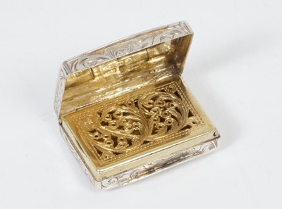 Lot 253 - Early Victorian silver vinaigrette of rectangular form, with foliate engraved edges