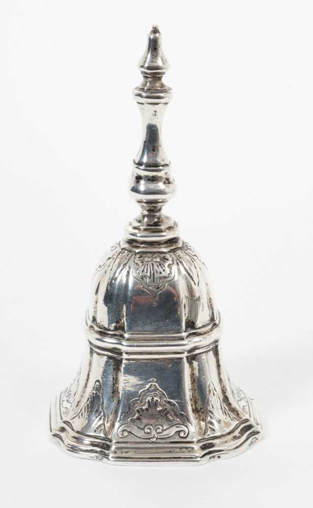 Lot 382 - Victorian silver table bell, in Queen Anne style with chased decoration, (London 1896), maker H B, all at 6ozs 11.4cm in length