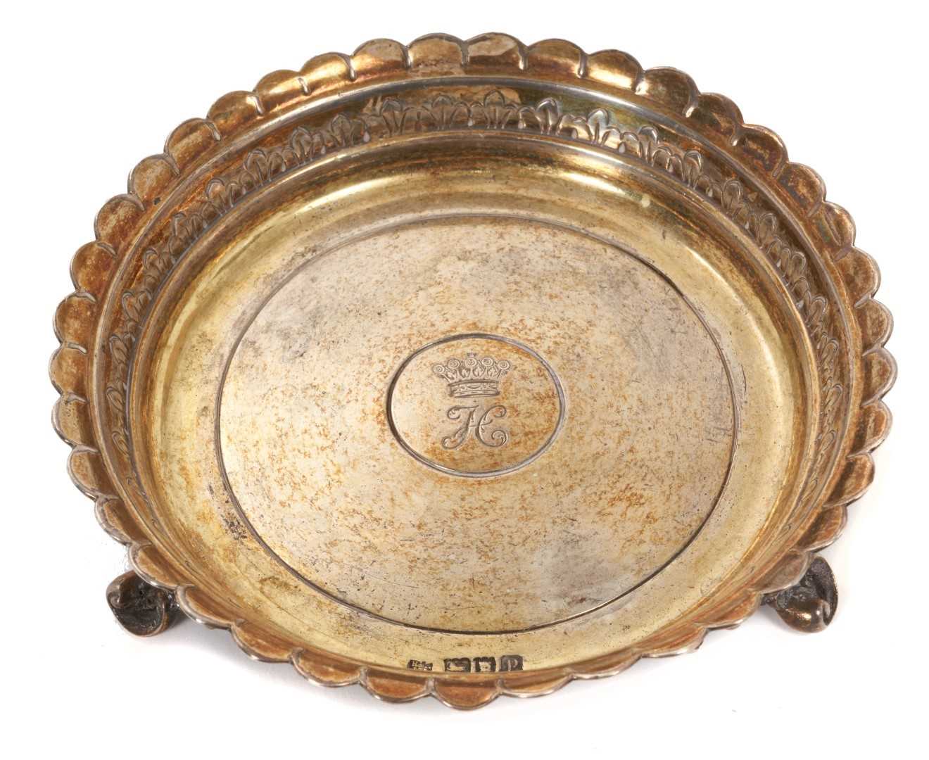 Lot 11 - Edwardian  Hunt and Roskell silver gilt armorial round dish