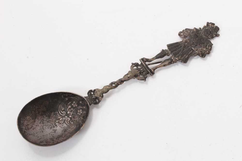 Lot 385 - 19th century Dutch silver serving spoon, the terminal modelled as a male figure, 24.5cm in overall length.