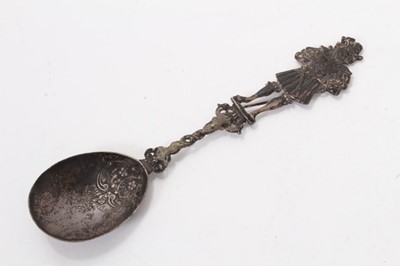 Lot 385 - 19th century Dutch silver serving spoon, the terminal modelled as a male figure, 24.5cm in overall length.