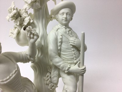 Lot 51 - A Derby bisque group emblematic of Autumn and Summer, late 18th/early 19th century, modelled as a huntsman with gun standing next to a woman holding a basket of flowers, in front of a tree with a w...
