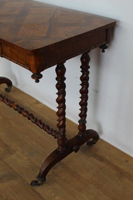 Lot 1263 - Mid Victorian rosewood and parquetry side table, rounded rectangular specimen wood inlaid top over reel moulded frieze with concealed drawer, on barley twist understructure and castors, 91cm wide x...