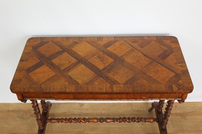 Lot 1263 - Mid Victorian rosewood and parquetry side table, rounded rectangular specimen wood inlaid top over reel moulded frieze with concealed drawer, on barley twist understructure and castors, 91cm wide x...