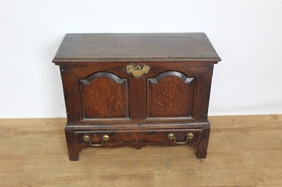 Lot 1264 - 18th century welsh oak coffer bach, with twin fielded panel front and top rising on wooden hinges, with single long drawer below on shaped frieze and stiles, 62cm wide x 32cm deep x 52cm high