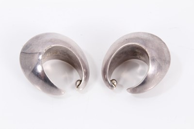 Lot 403 - Pair of Georg Jensen silver cuff earrings, probably designed by Nana Ditzel for Georg Jensen, model 126, London import hallmarks 1958-1959. Georg Jensen marker's mark.