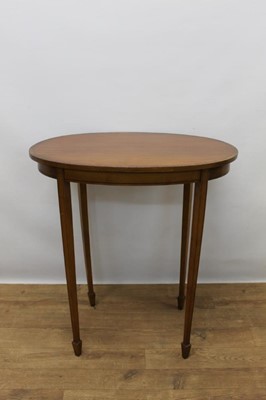 Lot 1359 - Edwardian satinwood and tulipwood crossbanded oval side table