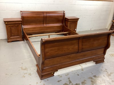 Lot 1351 - Contemporary cherrywood sleigh bed and matching bedside cabinets purchased from John Lewis