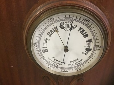 Lot 271 - Late Victorian aneroid barometer and thermometer in carved oak case