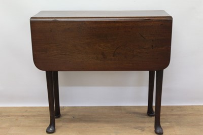 Lot 1365 - George II mahogany drop leaf table of small size standing on tapering legs with pad feet. The top and leaves of good original colour