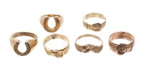 Lot 524 - Two gold buckle rings, 'Fede' ring with...