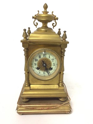 Lot 663 - Late 19th century French gilt brass mantel clock with enamelled and gilt metal dial, French movement striking on bell signed J.Mati in gilt metal case on plinth , pendulum and key present 30.5 cm