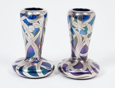 Lot 263 - Pair late 19th/early 20th century American silver overlaid blue glass vases.