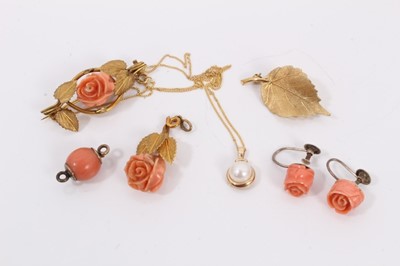 Lot 101 - 9ct gold mounted carved coral rose pendant, matching brooch