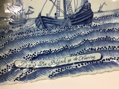 Lot 79 - A late 18th century Dutch blue and white delftware plaque, painted with fishing boats and bearing the inscription 'No 5 De Buysch op de Neering', mark on the back for De Porceleyne Bijl (The Porcel...