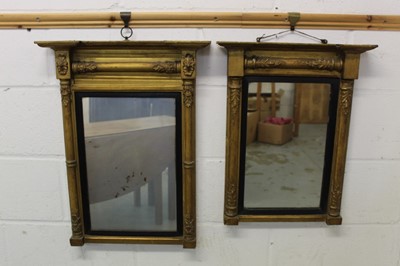 Lot 1343 - Near pair of George IV gilt gesso pier mirrors