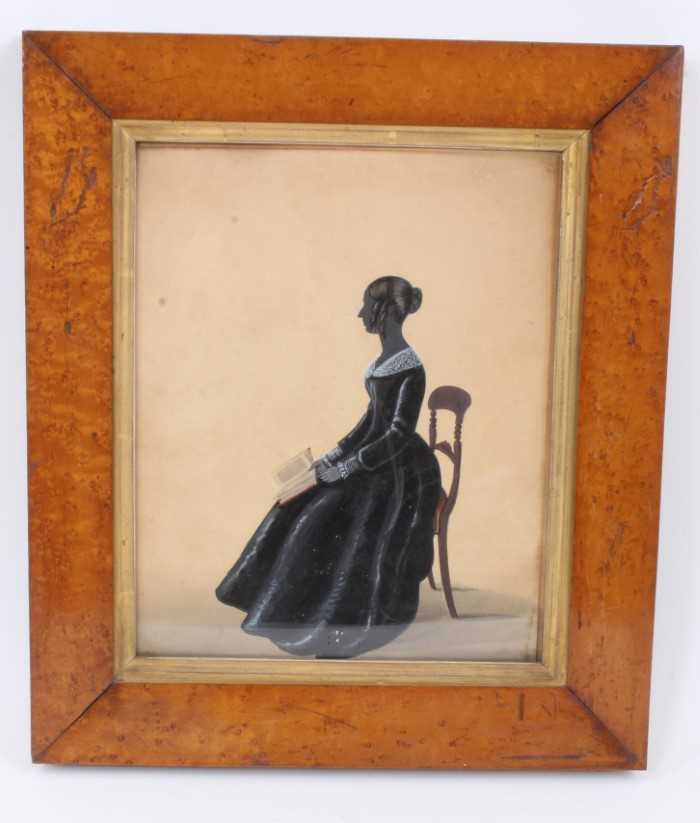 Lot 784 - Regency silhouette portrait of a lady seated in profile.