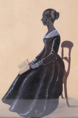 Lot 784 - Regency silhouette portrait of a lady seated in profile.